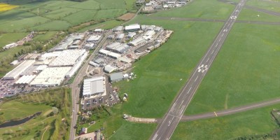 A plane takes off below us, Gloucester airport